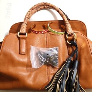 Brown, faux leather satchel with handles & shoulder strap